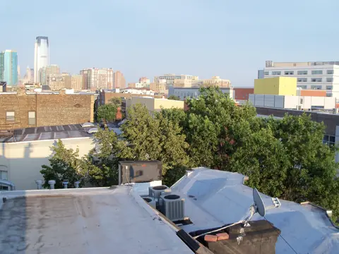 Joined flat roofs with rooftop units in Downtown Jersey City
